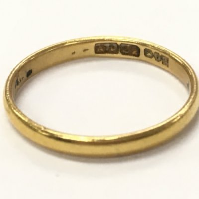 A 22ct wedding band , size M , 2.1g total weight. postage category A