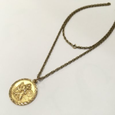 A 9 carat gold St Christopher pendant and chain , 13.2g total weight. Postage category a
