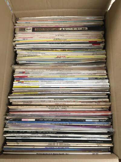 A box and five record cases of LPs by various artists including Elvis Presley, Johnny Cash, The Stranglers, ABBA and many more.