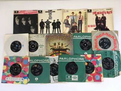 A collection of Beatles 7" singles and EPs comprising Long Tall Sally EP, All My Loving EP, Magical Mystery Tour EP and others.