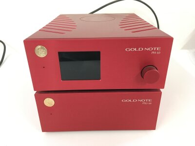 A Gold Note PSU-10 power supply and a PH-10 pre phono stage, both in the rare red finish.