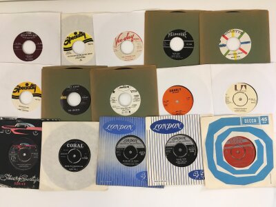 A collection of rock n roll and rockabilly 7" singles by various artists including Little Richard, Larry Williams, Eddie Cochran and others.