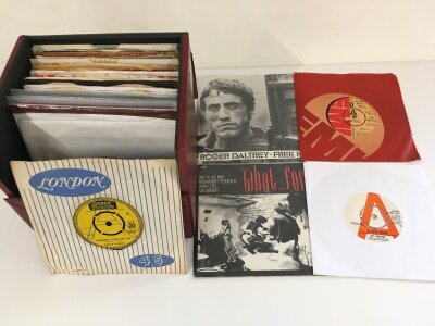 A record case of 7" singles including promo discs. Various artists including Bob Dylan, The Beatles, Rufus Thomas and others.