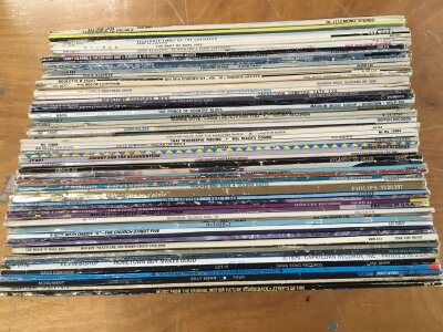 A box of LPs by various artists from the 1960s onwards.