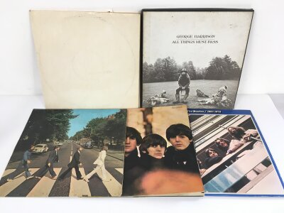 Five Beatles and related LPs comprising a French pressing of the White Album, All Things Must Pass (no poster), Abbey Road, Beatles For Sale and 1967-1970 Blue Album.