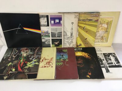 Two bags containing thirty prog rock LPs by various artists including Pink Floyd, Genesis, Greenslade and others.