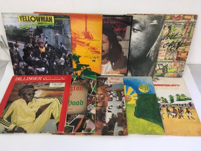 Two bags of reggae and dub LPs and 12" singles by various artists including Sugar Minott, Yellowman, Barrington Levy, Jimmy Cliff and many more.