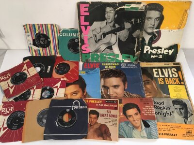 A collection of Elvis Presley LPs, 7" singles, EPs and CD box sets. Includes the first two LPs but in a poor condition.
