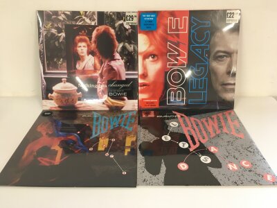 Four 180g and sealed David Bowie LPs and 12" singles comprising Legacy, Nothing Has Changed, Let's Dance LP and Let's Dance 12" single RSD exclusive.
