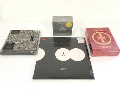 A Best Of James Bond 3LP set, George Michael - Listen Without Prejudice 3CD/DVD box set, ABBA - Singles Collection CD box set and Take That - The Circus Live DVD, all sealed (4).