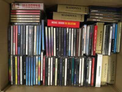 Four boxes of CDs, mainly Madonna but also comprising The Jam, Goldfrapp, Oasis and many more, many sealed.