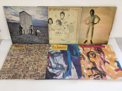 Two bags containing thirteen LPs by The Who and related albums including Who's Next, Rough Mix, Lisztomania and others.