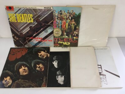 Seven Beatles and related LPs comprising Rubber Soul, Please Please Me (not black and gold label), White Album and others.