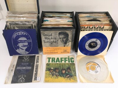 Three record cases of 7" singles and EPs by various artists including Sex Pistols, Oasis, Tyrannosaurus Rex and others.