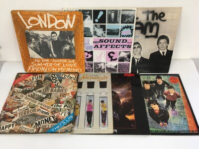 Fourteen punk rock LPs and 12" singles by various artists including The Stranglers, Sham 69, The Jam and others.