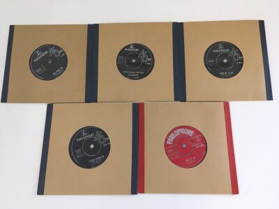 Five Beatles 7" singles comprising a first UK pressing of Love Me Do on red Parlophone label 45-R 4949, matrices 7XCE 17144-1N / 7XCE 17145 -1N, vinyl EX, plus early pressings of Please Please Me, From Me To You, She Loves You and I Want To Hold Your Hand.