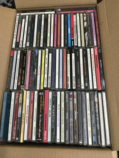 A box of jazz and blues CDs.