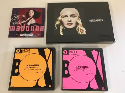 A sealed Madonna - Madame X 7"/CD/Cassette box set plus two further 7" single box sets and a collector's edition poster bag 7" of Express Yourself.