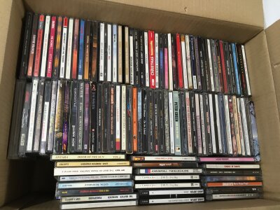 Four boxes of CDs by various artists including Pink Floyd, Led Zeppelin, The Strokes, Aerosmith and many more.
