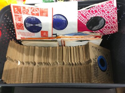 Two boxes of 7" singles by various artists from the 1960s onwards.