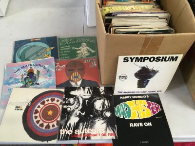 A box of 7" singles by various artists including Happy Mondays, Soul II Soul, The Auteurs and others.