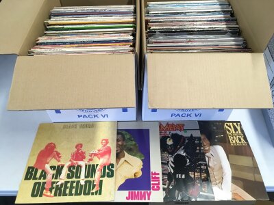 Two boxes of LPs and 12" singles by various artists including Parliament, Marvin Gaye, Black Uhuru and many more.