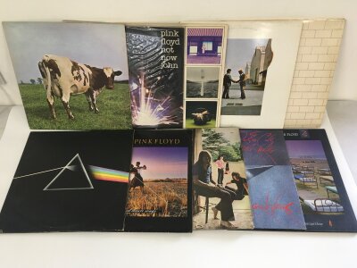 Nine Pink Floyd and related LPs and a 12" single comprising Dark Side Of The Moon, Atom Heart Mother, Ummagumma and others.
