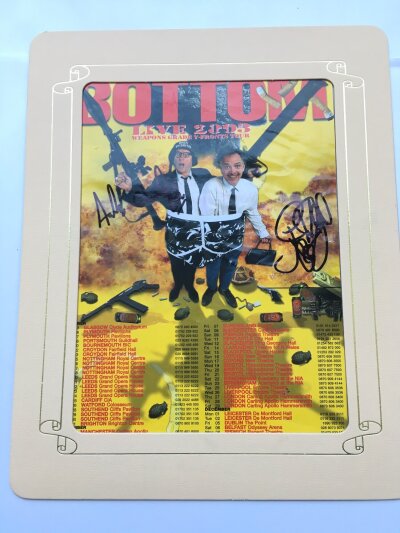 A Rik Mayall and Adrian Edmonson signed 2003 Bottom tour flyer, approx 20cm x 25cm including frame.