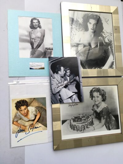 Five autographs comprising Jayne Russell, Lauren Bacall, Jean Simmons, Doris Day and Shirley Temple including a COA for the Doris Day signature.