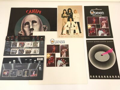 A collection of Queen related ephemera comprising two tour programs from 1977 and 1978 plus three fanclub colour fanzines, stamps etc.