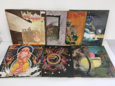 Two bags containing sixteen rock and psych rock LPs by various artists including Led Zeppelin, Hawkwind, Ten Years After and others. Please note Led Zep II is on red/plum Atlantic labels. The Hawkwind LPs are sadly water damaged.