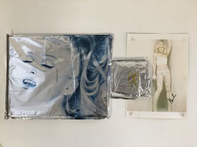 A sealed Madonna Sex book plus an opened Erotica CD and a signed Madonna photo, no COA.
