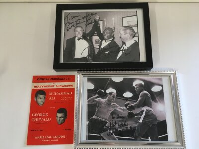 Boxing interest. Two signed photos of 'Marvellous' Marvin Haggler and Sir Henry Cooper plus a Muhammad Ali boxing program.