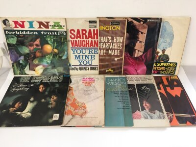 Two bags containing thirty female soul groups and solo singers' LPs by various artists including The Supremes, Aretha Franklin, Nina Simone and others.