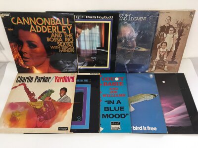 Two bags containing eighteen jazz LPs by various artists including Charlie Parker, Cannonball Adderley, Andy Bey and others.