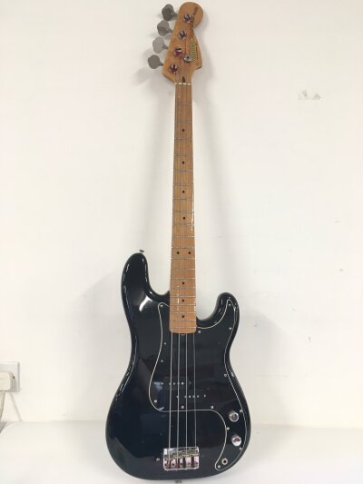 A Jodee Performer bass guitar. Comes with a soft carry case.