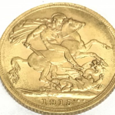 A gold 1915 full sovereign. Postage category A