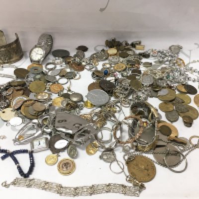 A collection of assorted costumes jewellery including some silver items.