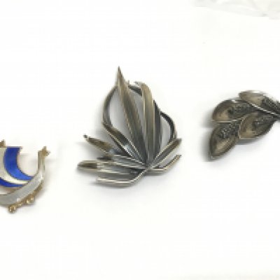 Anton Michelsen Rougie silver brooch, Aarre & Krogh Danish brooch and a silver enamel Viking boat brooch . Postage category B