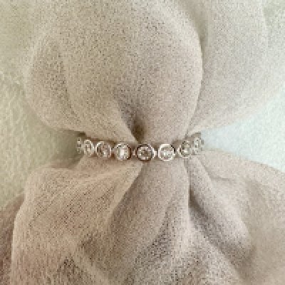 A 9ct white gold half eternity ring, Approx weight 2.17 grams. Size M.