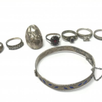 Silver rings and a silver bangle. Postage category A