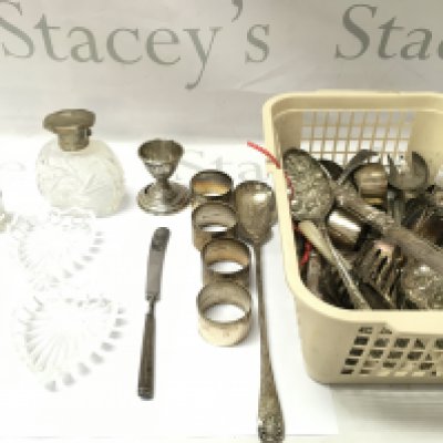 A collection of sorted silver and silver plate items and other items including silver topped glass bottle. Postage B