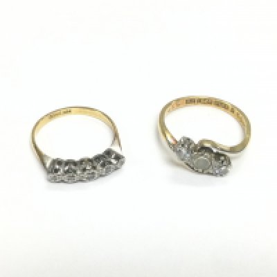 Two 18ct gold and platinum rings set with small diamonds, total approx 5g. Shipping category A.
