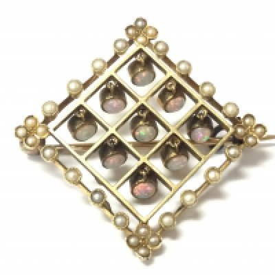 A gold opal and seed pearl set brooch. 6.25gPostage B