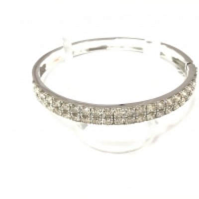 A 9ct white gold bangle set with two rows of diamonds. Diamonds approx 7ct and bangle has diameter of 6.5cm