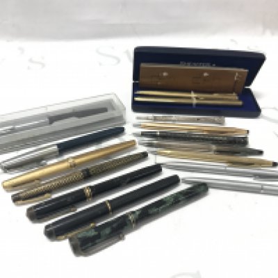 A Collection of fountain pens and pencils including 14ct gold tipped examples. Postage category B