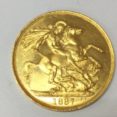 A 1887 double sovereign. Postage A