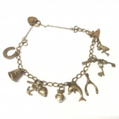 A 9ct gold charm bracelet with assorted charms. Total weight 8.86g Postage B