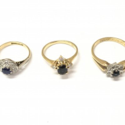 Three 18ct gold sapphire and diamond cluster rings. Sizes G 1/2 I and N. 7.6g Postage A
