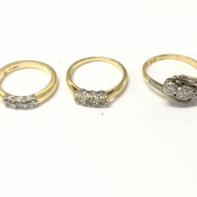 Three 18ct gold 3 stone diamond rings. Sizes K N and O. 11.16g